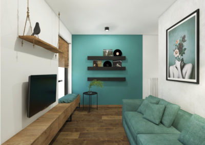 Pokój gościnny ze ścianą i sofą w kolorze morskim